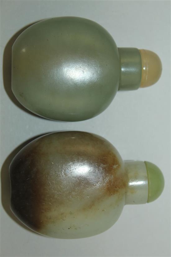 Two Chinese jade flattened ovoid snuff bottles, 1800-1900, 5.7cm